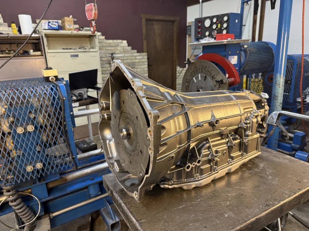 A transmission positioned on test equipment in the AMPro shop